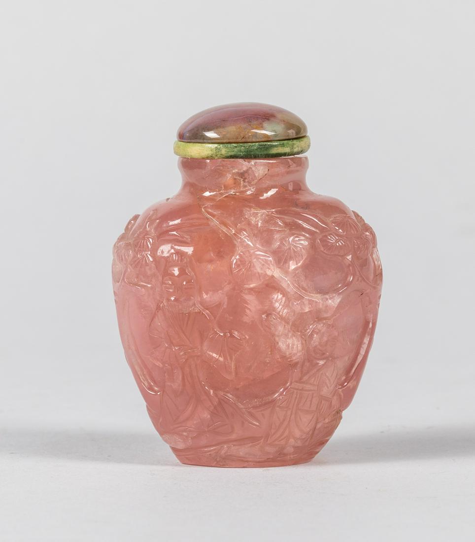 18th Chinese Antique Tourmaline Like Snuff Bottle: Rounded form of 18th Chinese carved pink tourmaline like snuff bottle, cracked, agate stopper. 2.5 inch H. Provenance: the Estate of C. D. Chen. 1980.