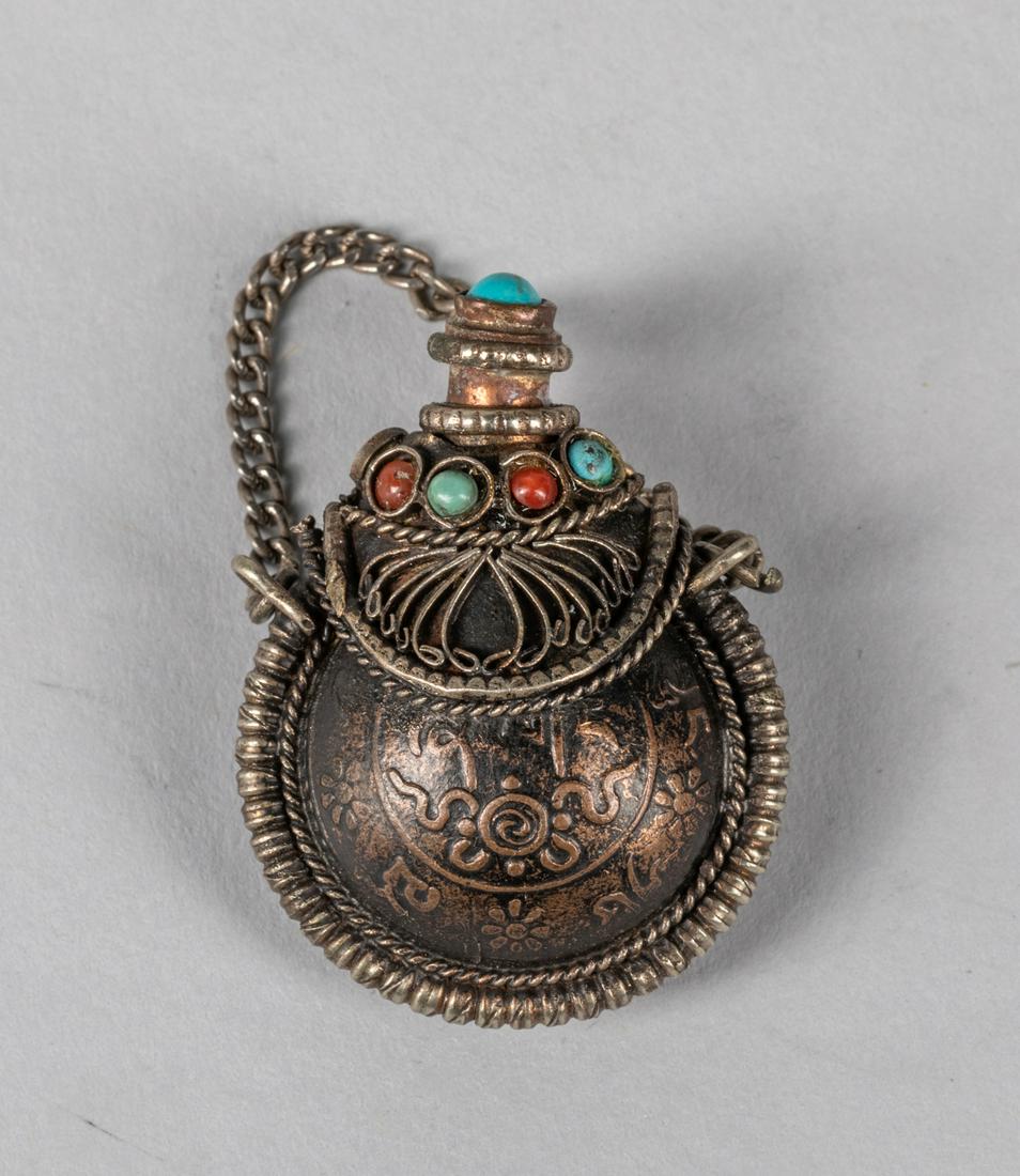 Tibetan Coin-shape Snuff Bottle: Tibetan old coin shape snuff bottle of shi-shi decoration. 1.3 inch H.