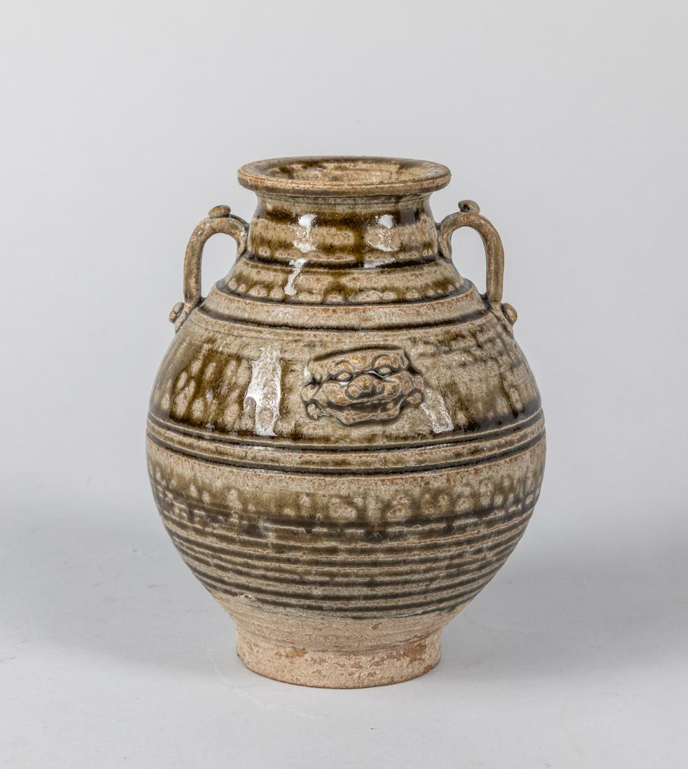 16-17th Korean Antique Glazed Jar: Korean antique brown glazed jar with two handles, The estate of the Richard. 6.5 inch H.