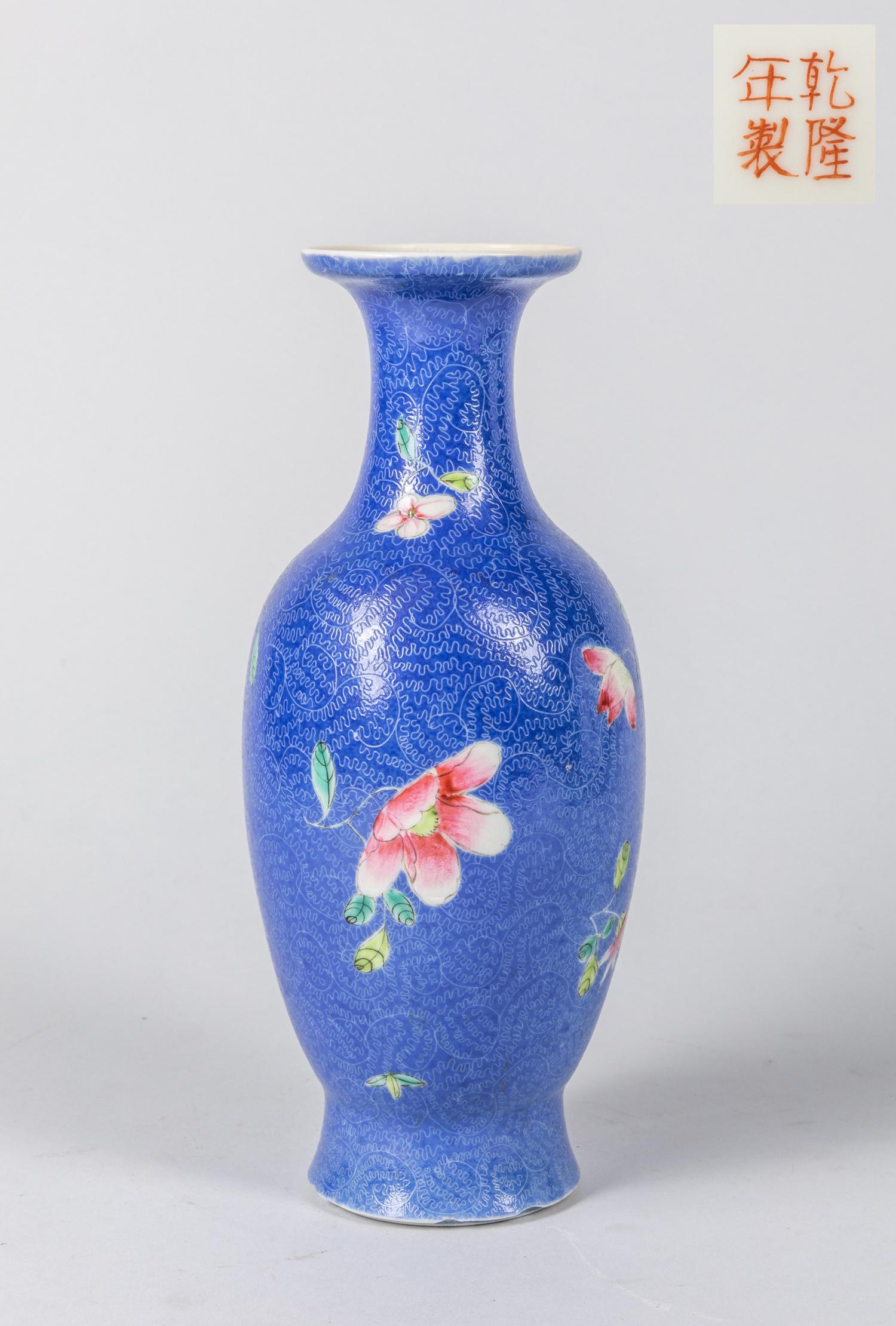 Chinese Antique Enameled Porcelain Cabinet Vase: Late Qing dynasty Chinese enameled vase, Qianlong mark on the bottom, flowers decoration, minor chips, 10 inch H.