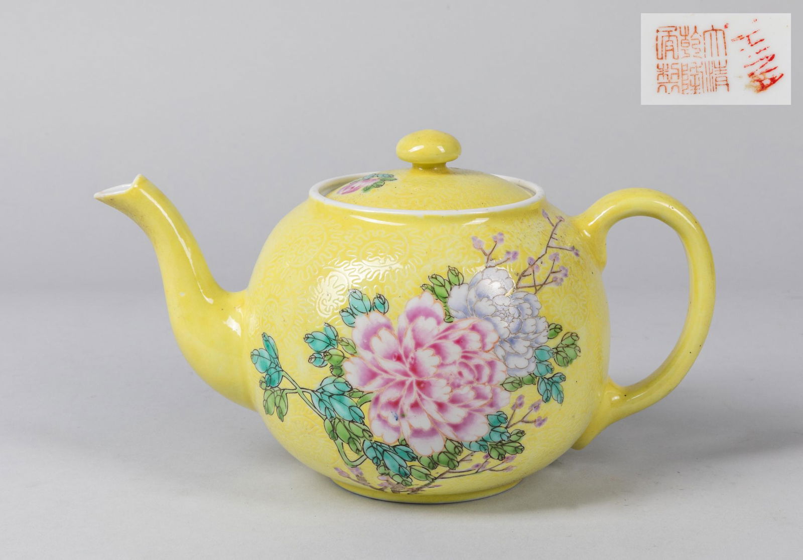 Chinese Antique Enameled Porcelain Pot: Late Ching to Republic period Chinese enameled porcelain tea pot, emperor yellow color and hand painted flowers decoration. Minor chips, 5.25 inch H; 9.25 inch L.