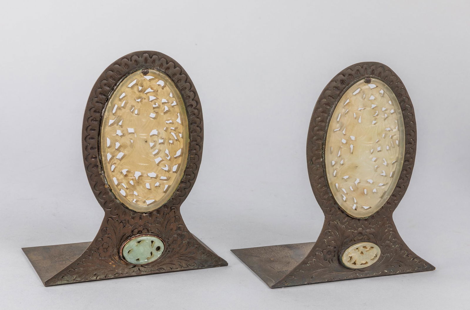 Pair of Chinese Antique Jade & Bronze Book Stands: Pair of collectible bronze book stands with open works carved jade. 6.75 inch H. The estate of the Pasadena, CA, 2019.