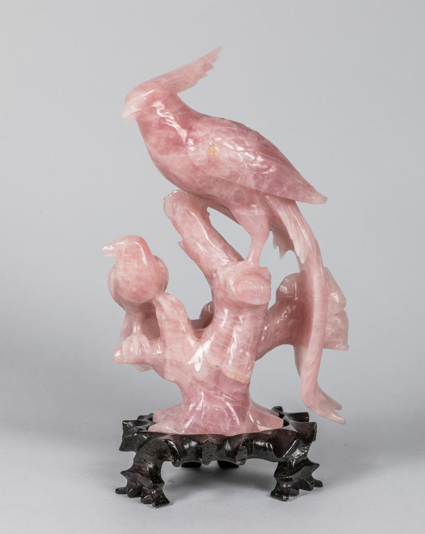 19th Chinese Antique Carved Rose Quartz Figure: 19th Chinese antique carved rose quartz figure of bird, with wood stand, minor chips, 9.5 inch H. The estate of King Chun Lun, CA, 1999
