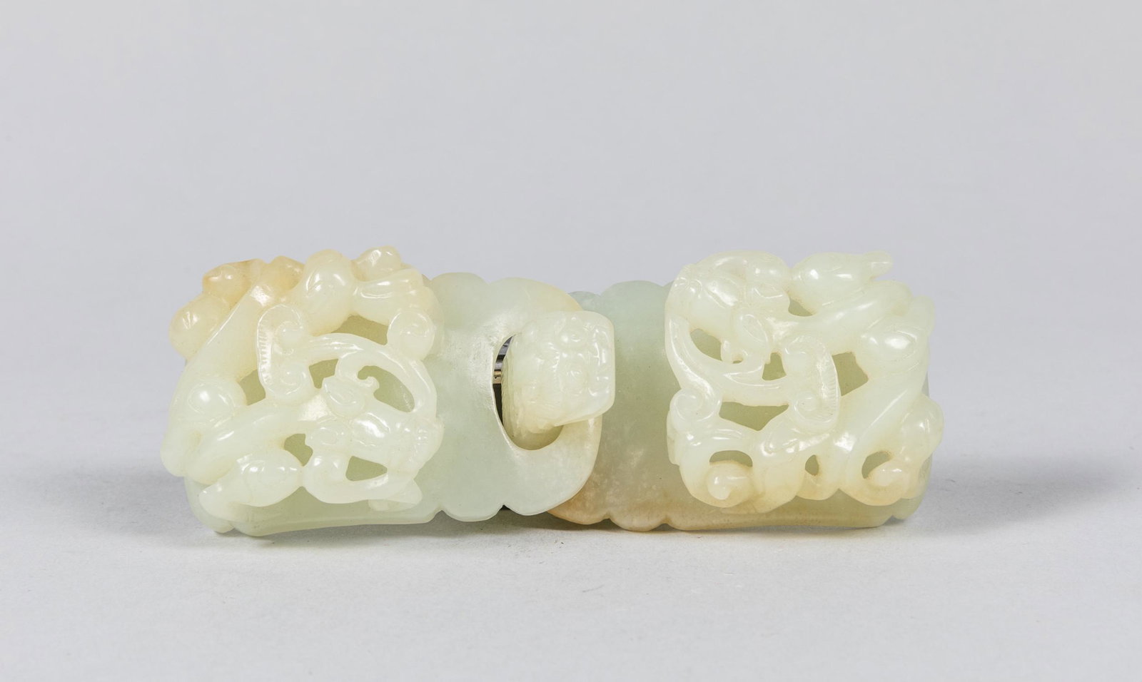 Chinese Carved White Jade Belt Buckle: Each section of square outline, carved and undercut with a sinuous chilong holding a sprig of lingzhi in its mouth. 1.38*2.28 inch each