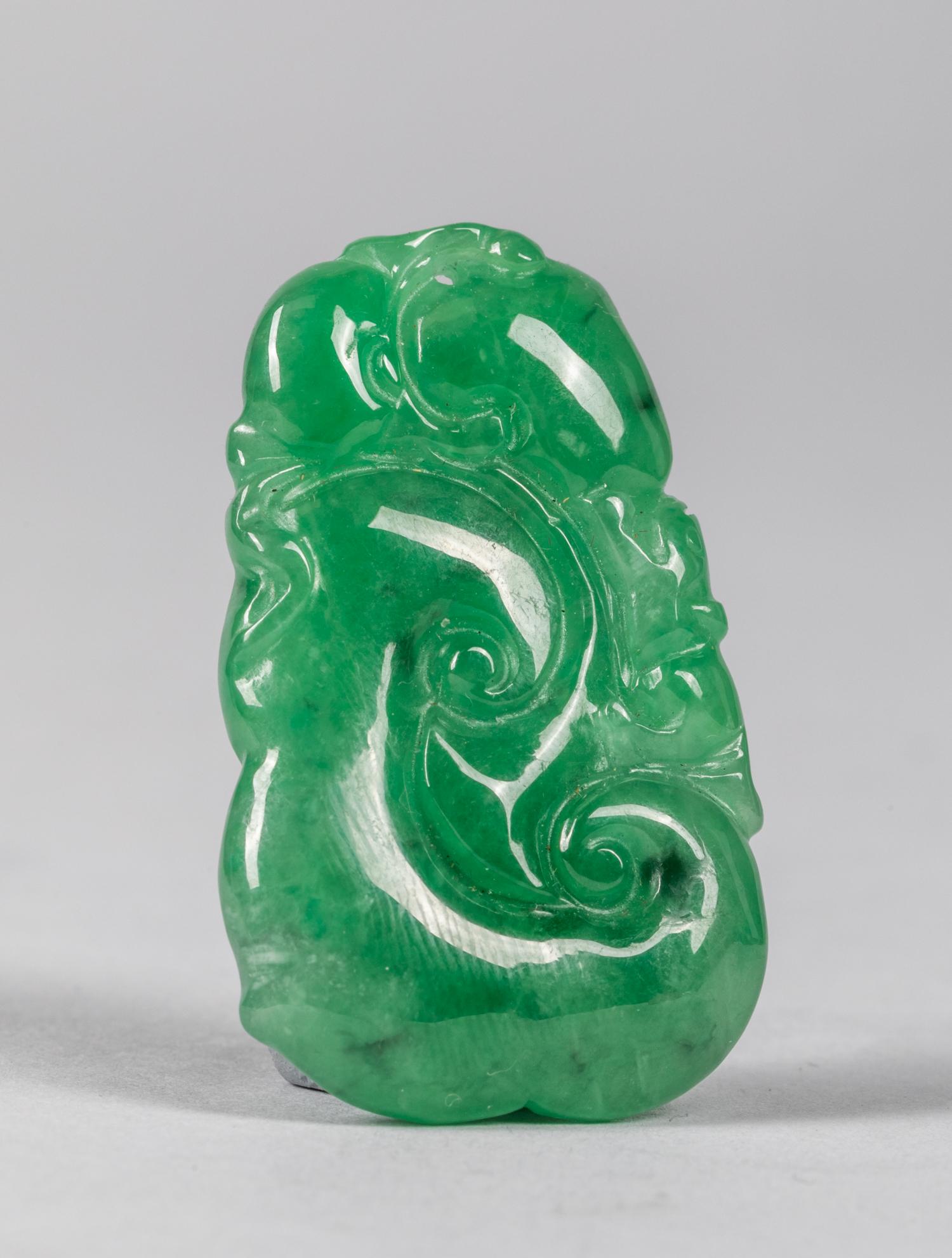 Chinese Export Apple Green Color Jadeite Stone Pendant: Carved ruyi-shape pendant, 1950-1980 period export. 1.5 inch L.