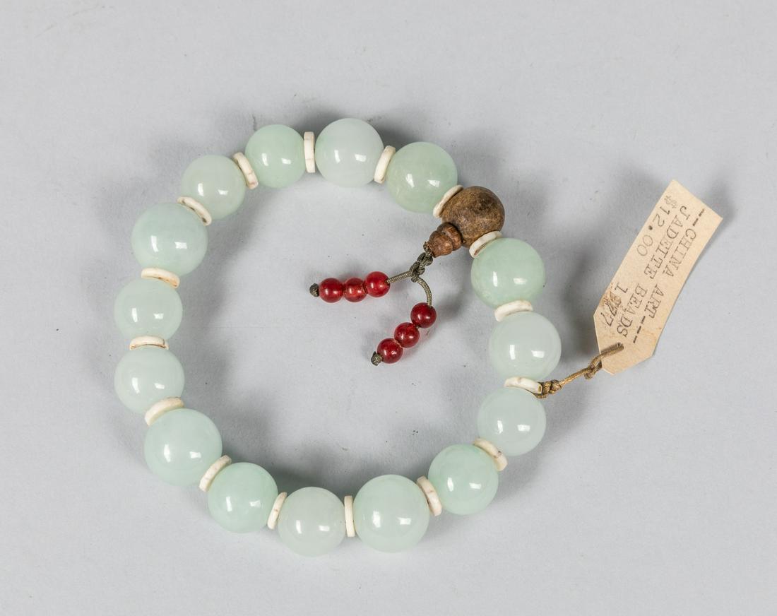Chinese Export Jadeite Stone Prayer Beads: Composed of 18 pieces export jadeite stone prayer beads, connected by one agarwood bead. 0.63 inch diameter