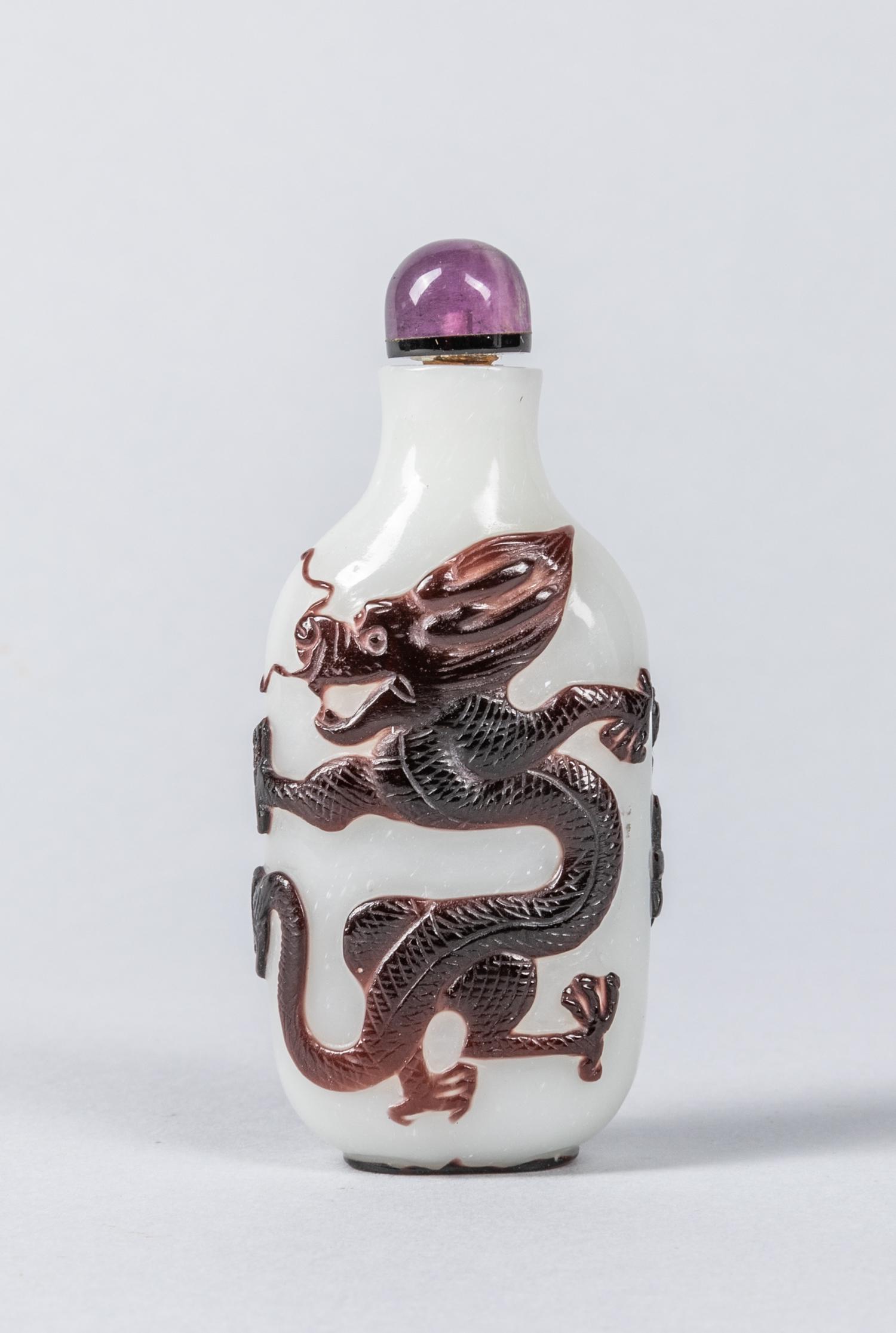 Chinese Antique Carved Overlay Glass Snuff Bottle: Chinese overlay glass carved snuff bottle of dragon. 3 inch H.
