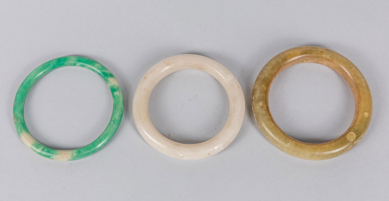 Group of Chinese Antique Bangle Bracelet: Group of three Chinese Qing dynasty bangle bracelet. 3.5 inch D ( largest, out D). Minor chips and cracked. The Estate of the C.D.Chen, Hong Kong, 1985.