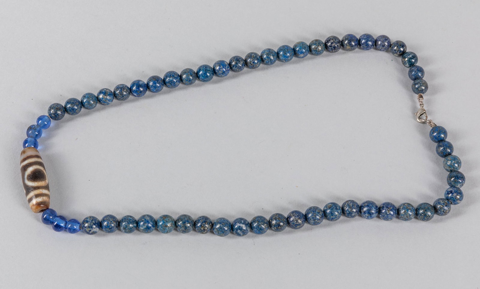 Chinese Export Dzi Beads Necklace: 1970-1990 period Chinese export necklace, connected by Dzi beads, glass & Lapis Lazuli. 11.5 inch L.