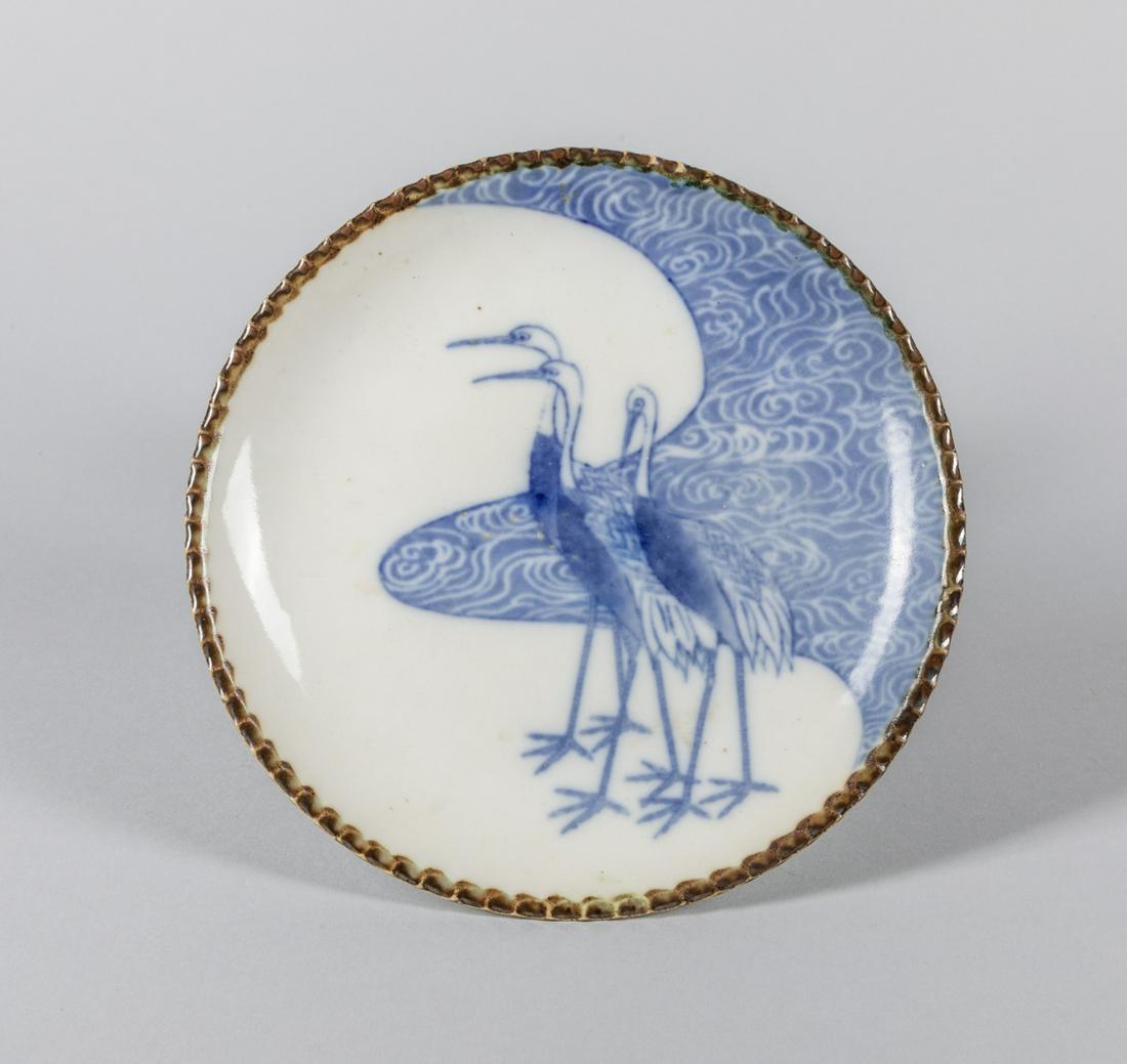 Japanese Old Blue & White Porcelain Plate, 1920-1950: Japanese B/W porcelain plate decorated with crane. 7 inch D.