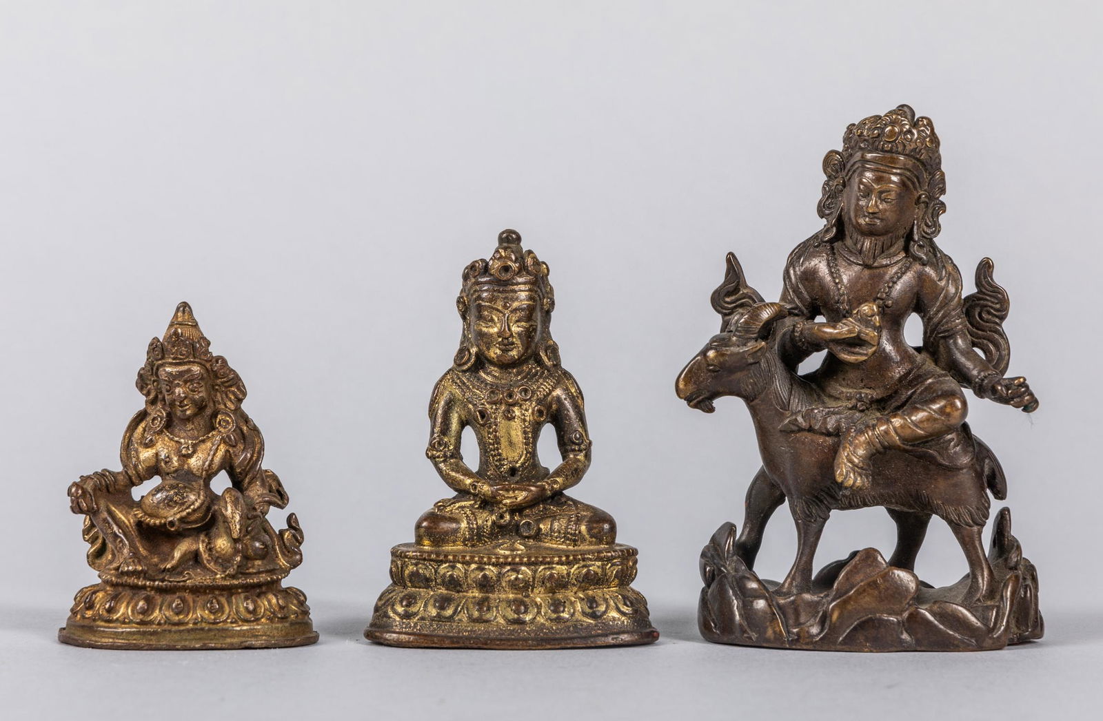 Set of 17-19th Tibetan Gilt Bronze Buddha: Group of three Tibetan antique gilt bronze Mini-buddha. 3.6 inch H. (largest)