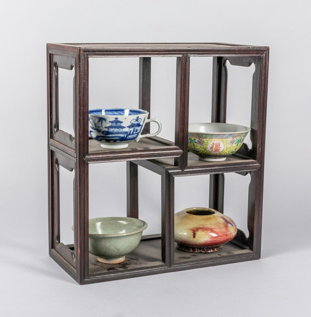 Set of Chinese Antique Mini-cabinet & Porcelains: Chinese antique rose wood Mini-cabinet, three bowl/cups, one flambe glazed washer. 12-13.25-5.75 inch (cabinet size). The Estate of the Los Angeles, 1999.