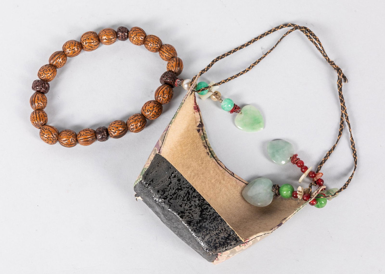 Chinese Antique Seed & Jade Prayer Beads: Chinese antique seed prayer beads, carved jade & stone suspended on the end. 0.5 inch D.