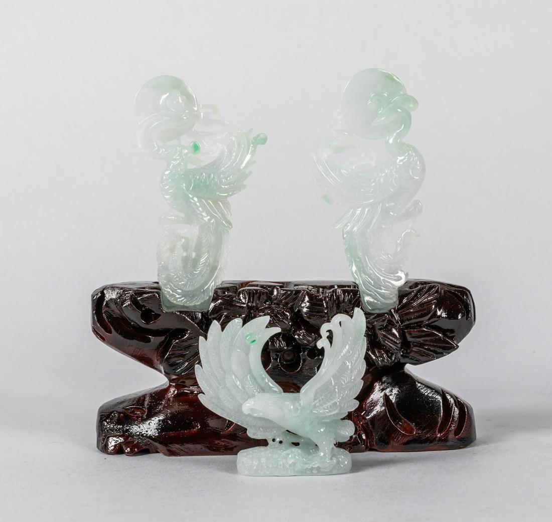 Group of Chinese antique Jadeite Figures: Group of three jadeite figures, one eagle with two phoenix, with a wood stand. 3 inch L