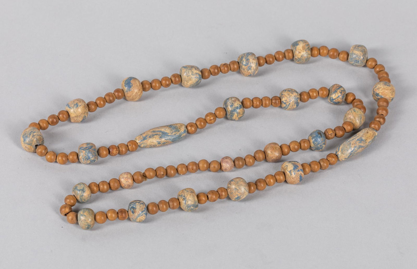 North African Antique Beads Necklace: Antique beads necklace composed by stone and wood beads, North African. 18.25 inch L