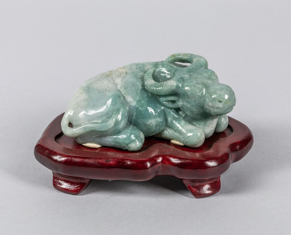 Chinese Antique Carved Jade Jadeite Figure of Buffalo: Chinese carved jadeite buffalo with stands. 4.5 inch L.