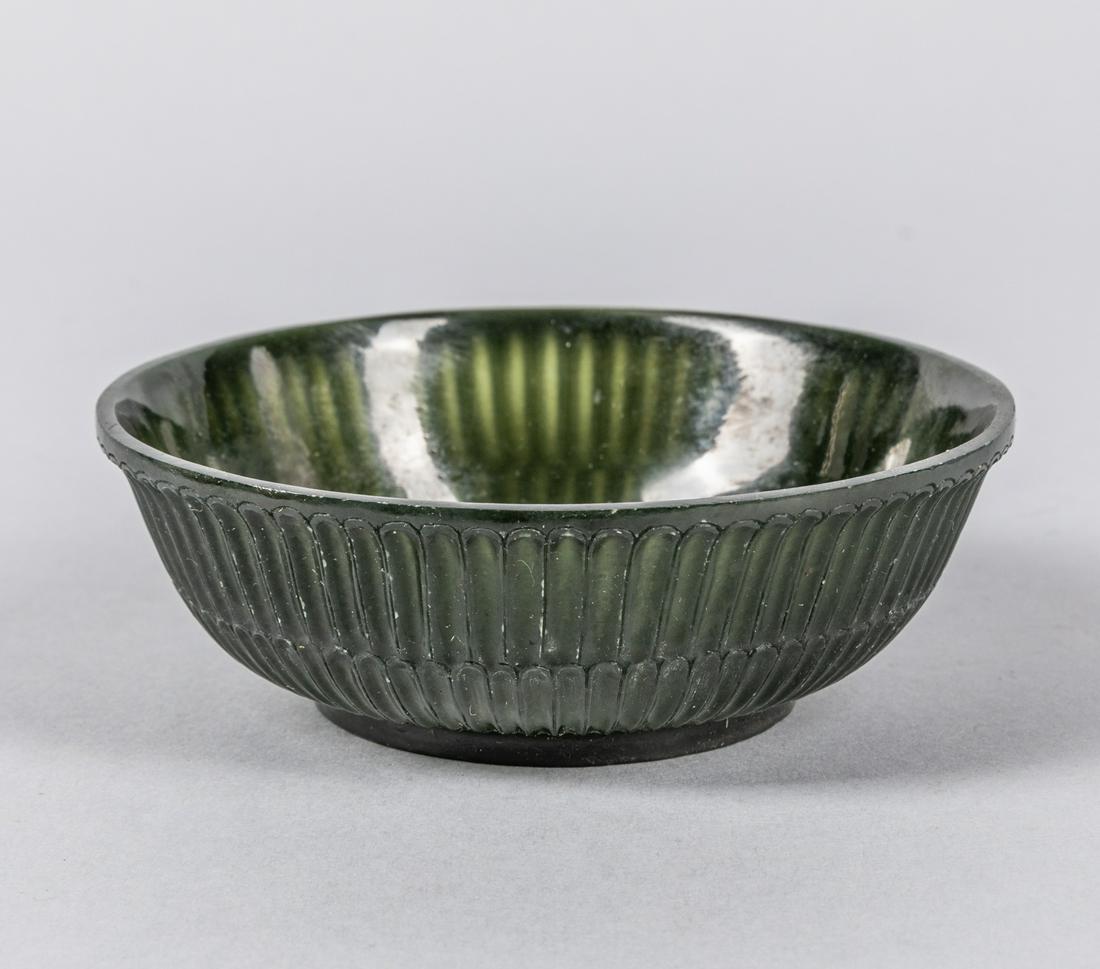 19th Chinese Antique Carved Jade Cup: Chinese carved Spinach Jade cup, outside carved bamboo decoration. 4 inch D. 1.5 inch H. The Estate of the Rodriguez. 1996.