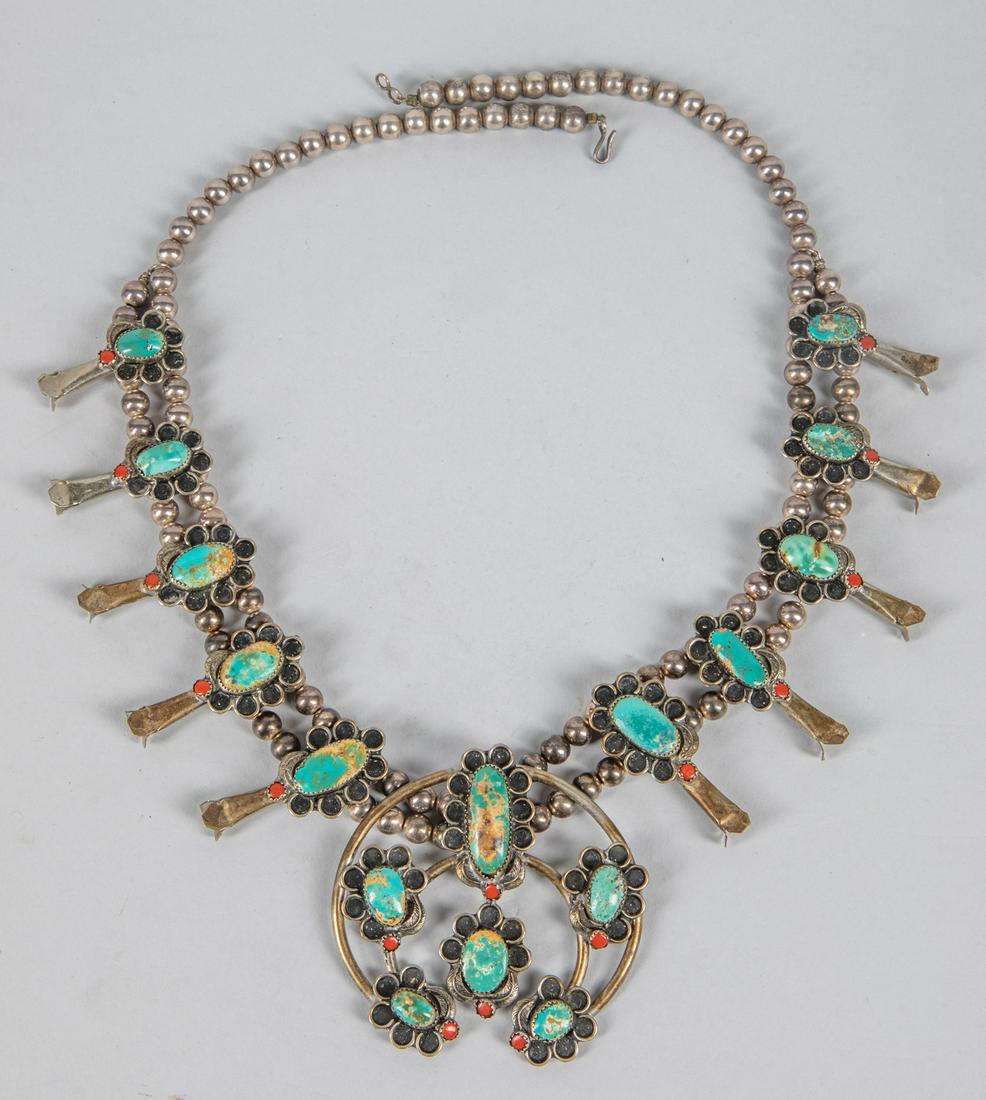 Collectible Vintage Squash Blossom Silver Necklace: Squash blossom necklace composed by turquoise & coral, 800 silver. 5.67 oz. W; 27 inch L.