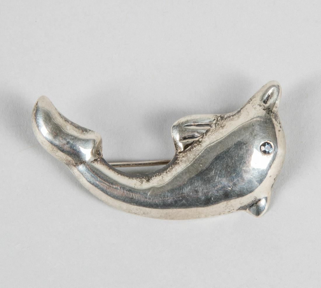 Art Sterling Silver Crystal Dolphin Brooch: Sterling dolphin brooch highlighted with crystal eye, 925 stamped. 1.96*1.08 inch