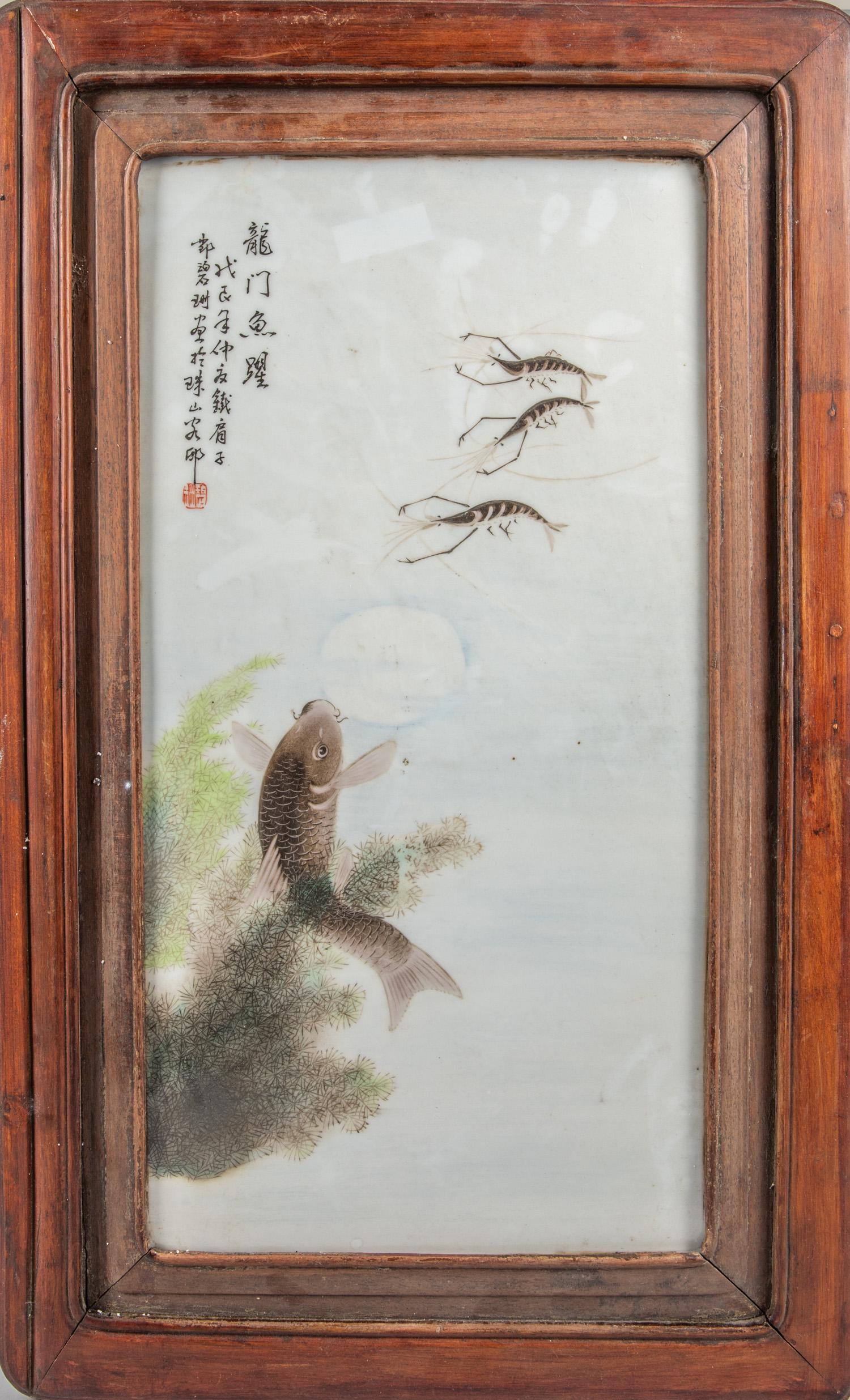 Chinese Antique Famille Rose Wall Hanging Panel: Chinese antique famille rose porcelain panel, with rose wood frame. 27.75-17 inch. The estate of the Japanese Antique Store Closed Sale, Los Angeles, 2020.