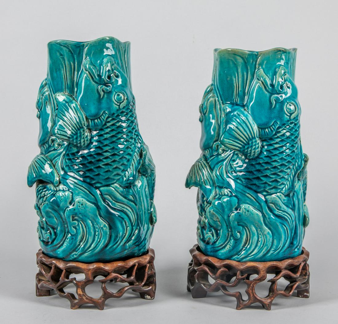 Pairs of Chinese Antique Turquoise Glazed Porcelain: Pairs of turquoise coloration glazed porcelain vase decorated with fish & lotus. With wood stands. 10.5 inch H; 6 inch W. (with stands).