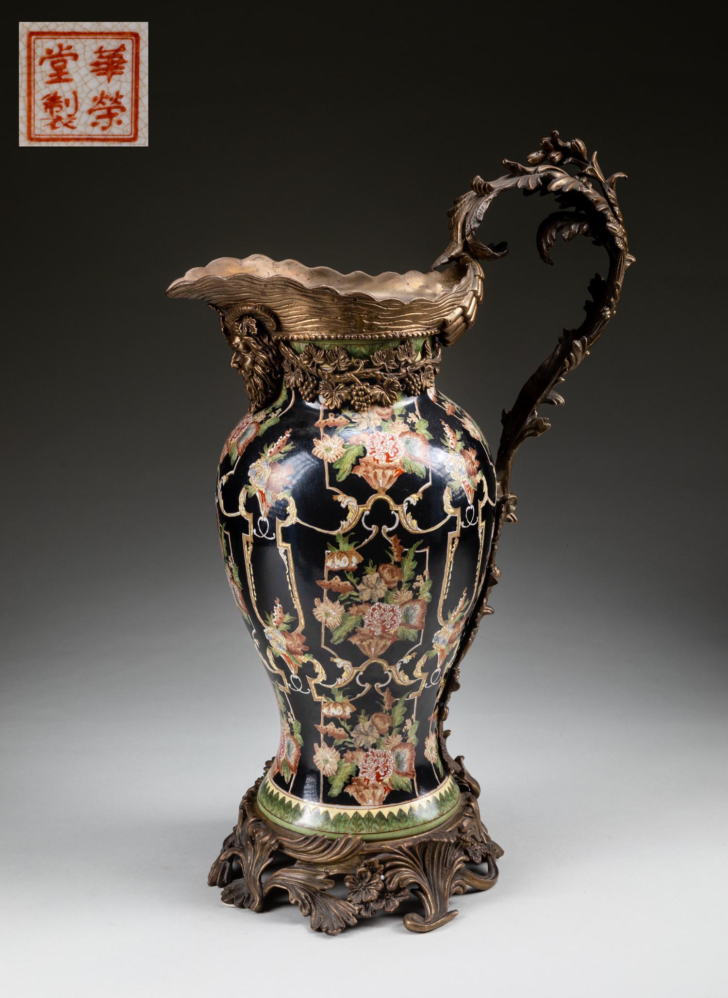 Early 20th Chinese Antique Rose Famille Porcelain Ewer: The bulbous body with tall slender neck fitted with an ormolu border and a curved ormolu handle cast as a branch incorporating leaf tips, the ewer decorated with foliate floral blossoms, all against b