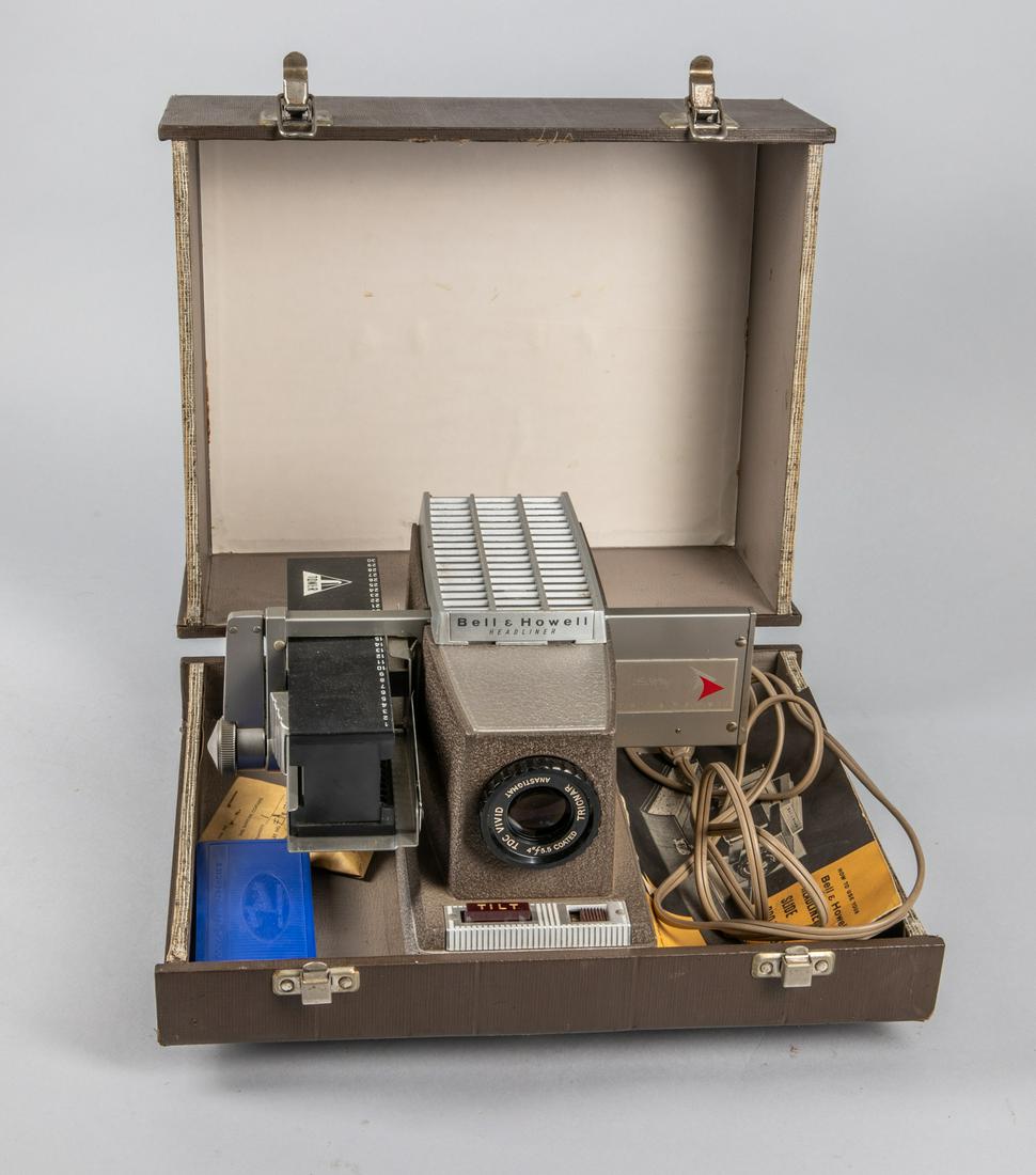 Vintage Bell & Howell Headliner Projector: Tested works. 14-11-6.75 inch.