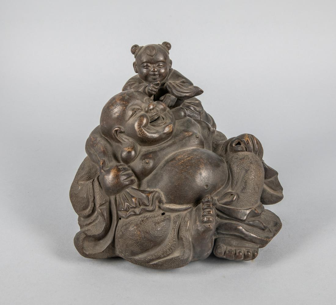 Large Chinese Zisha Figure: Carved Zisha figures of buddha with boy. 6.5 inch H; 8 inch W.