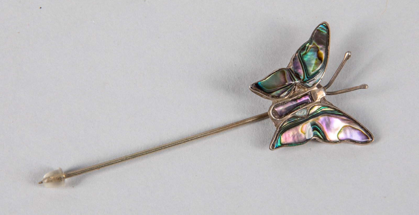Sterling Abalone Lapel Hat Pin: Of butterfly shape, sterling abalone lapel hat pin.