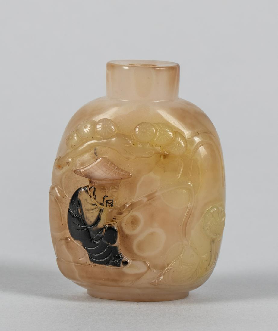 Chinese Carved Cameo Agate Snuff Bottle: Chinese carved cameo agate snuff bottle; the front with design of a figure fishing on a boat picked from the tan "skin" above incised waves; 2.3-1.75.