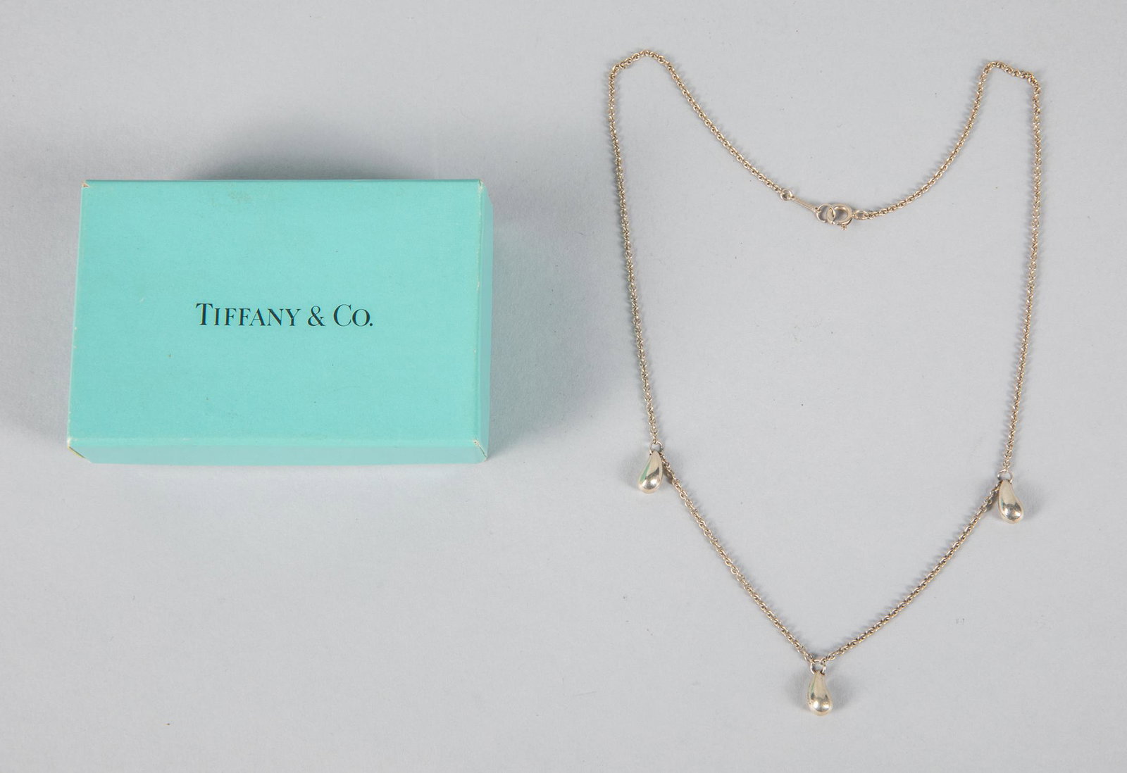 Collectible Tiffany & Co. Silver Necklace: Stamped Tiffany & Co. 925. Designer Elsa Peretti. 7.75 inch L.