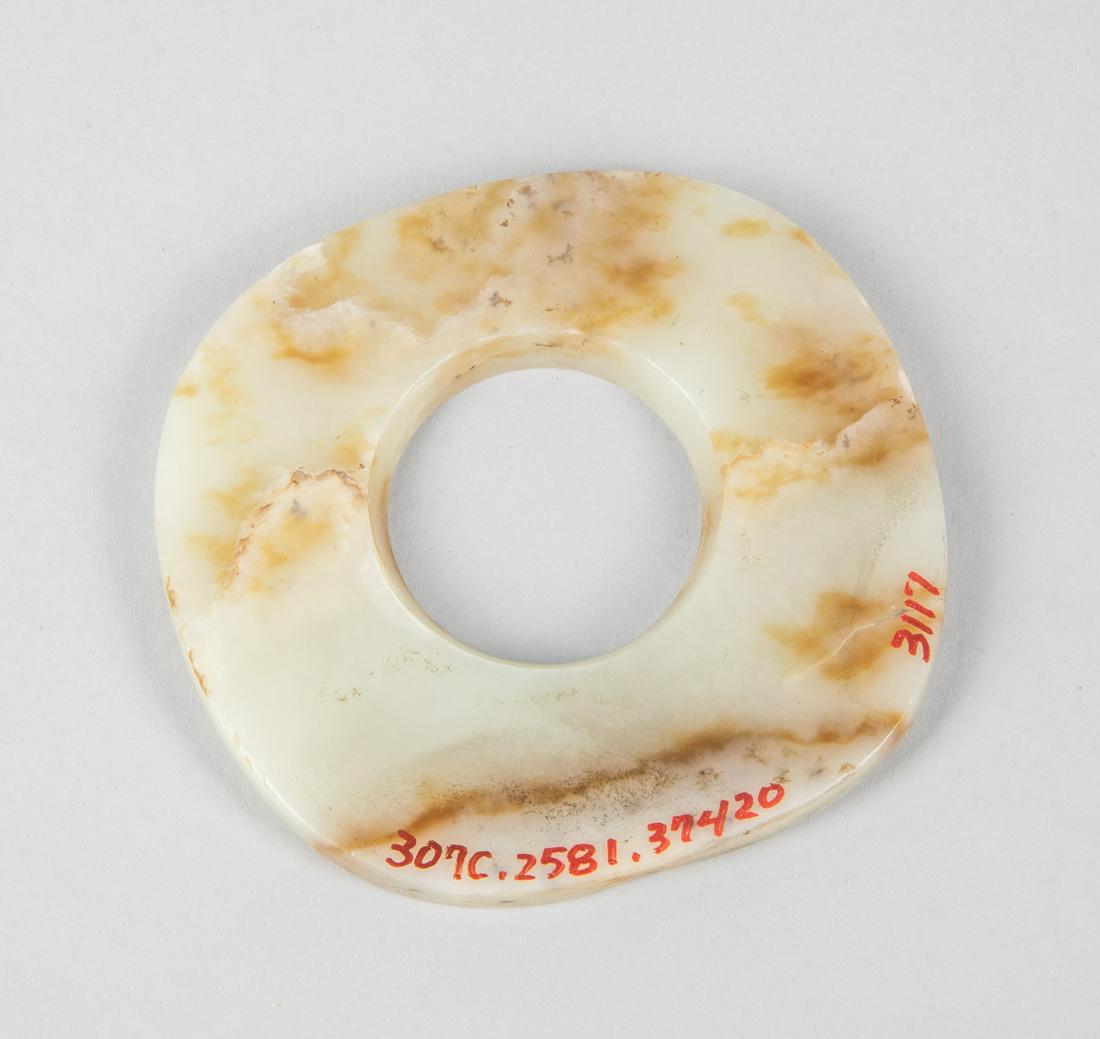 Chinese Jade Carving of Bi: Circular bi discs with a round aperture at the centre, unadorned and smoothly polished, White-brown color. The estate of the Choi Hoo King, HK. (1930-2005). 3.5-3.6 inch.