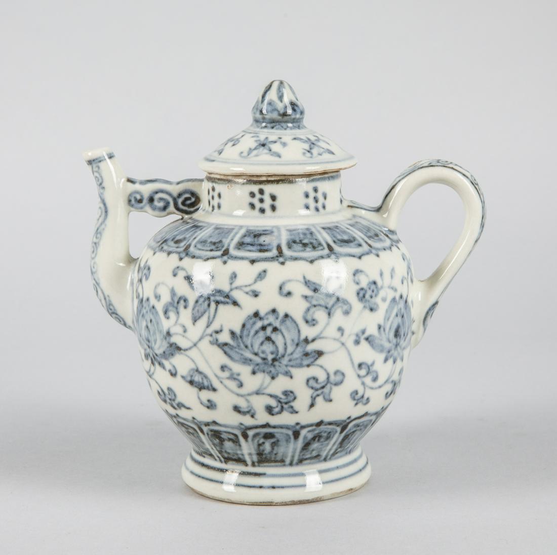 Chinese Blue & White Porcelain Pot: Chinese light blue & white porcelain pot, decorated with lotus. Carved Chinese trade mark, 6.5 inch H; 6.4 inch L. The estate of P. C. Chen. Los Angeles, 1980.