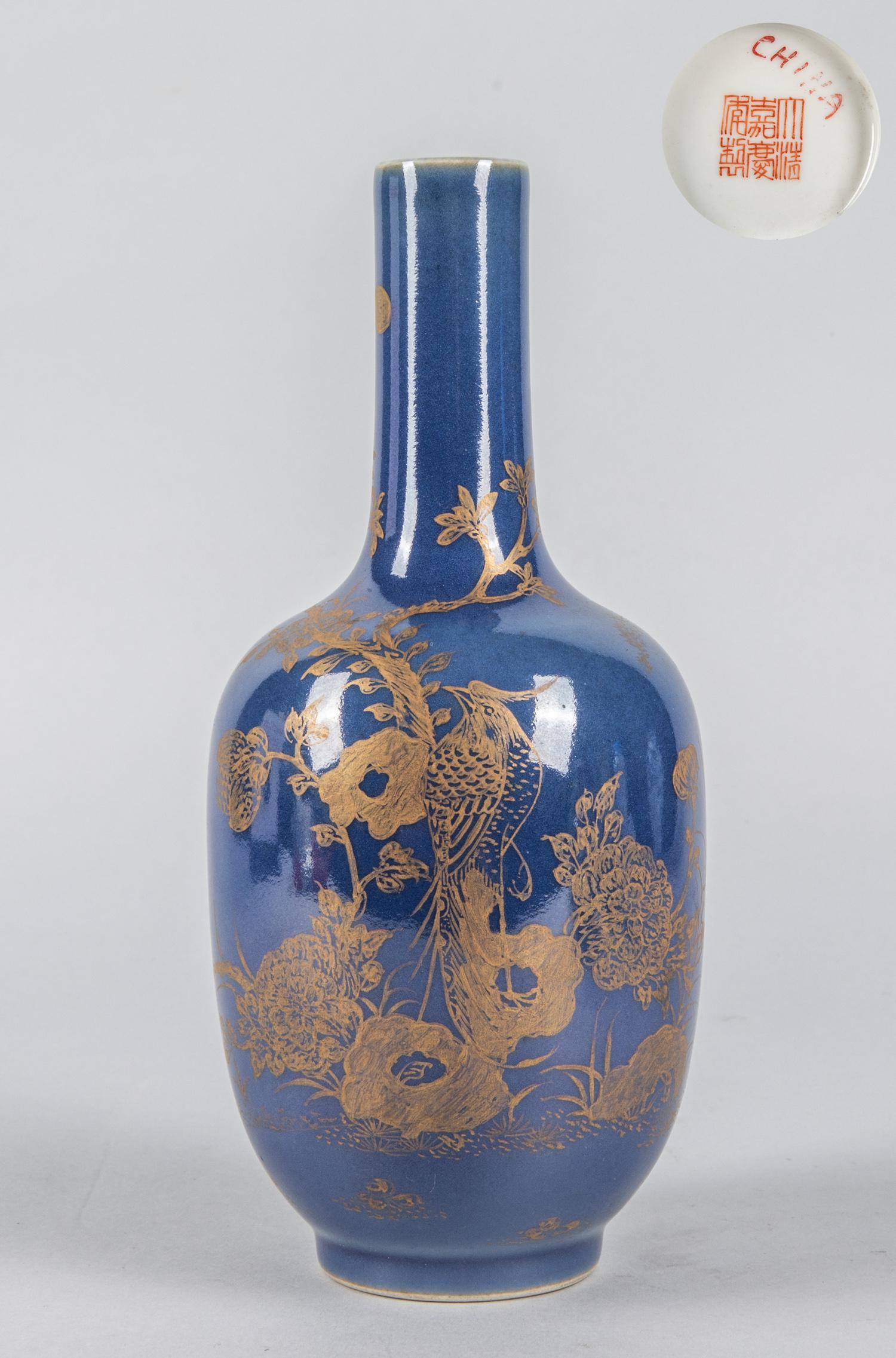 Chinese Famille Rose Porcelain Vase: Chinese gold color on blue glazed porcelain vase, decorated with bird & tree. 9 inch H; 3.75 inch W. The estate of P. C. Chen. Los Angeles, 1980.