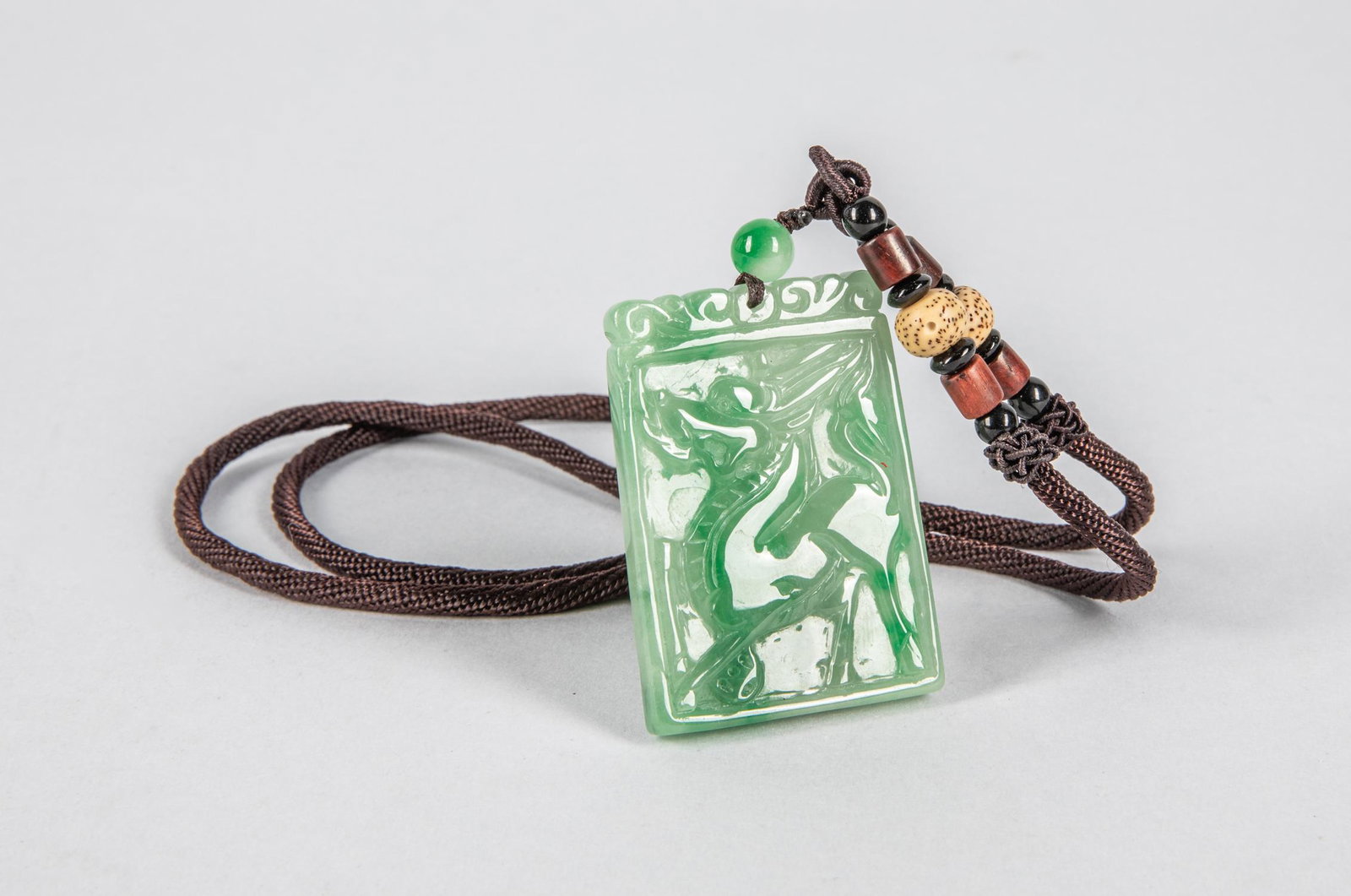 Chinese Export Jade Jadeite Carving: Chinese green color jade jadeite carving, decorated with beast, bat, ruyi. 1.5-2 inch.
