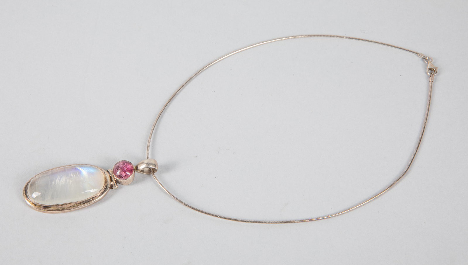 Vintage Designed Moonstone & Silver Necklace: Collectible art necklace with large moonstone pendant. Pendant size: 2.5 inch L. Necklace : 15 inch L.