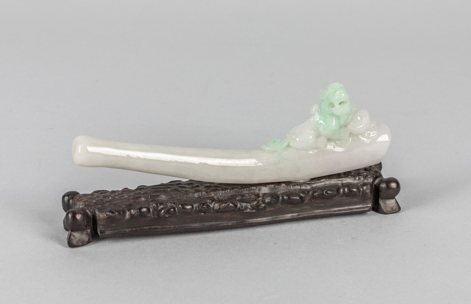Chinese Jade Jadeite Carving of Holder: Chinese carved jadeite dragon type holder, with wood stand. 5.25 inch L.