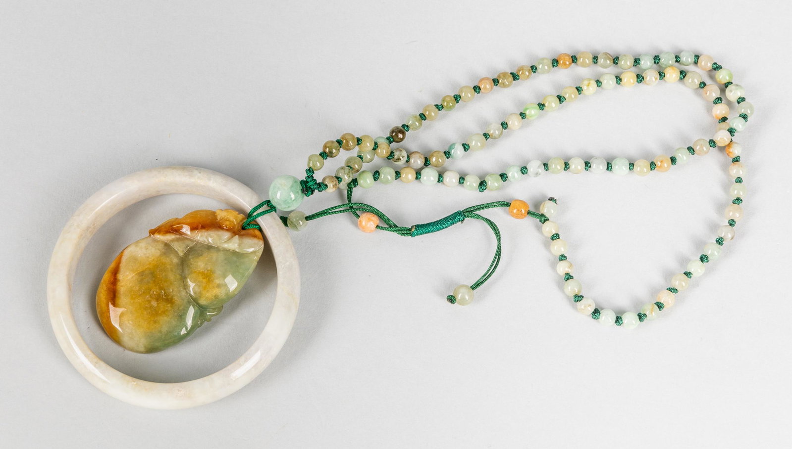 Large Chinese Jadeite Necklace: Large Chinese jadeite carved pendant,15 inch L.