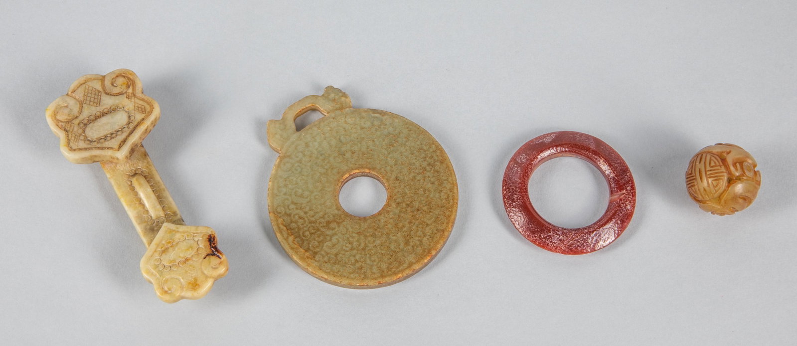 Group of Chinese Jade & Stone Carvings: Group of four Chinese export carvings including jade, stone, agate. 3.2-3.5 inch. (largest).