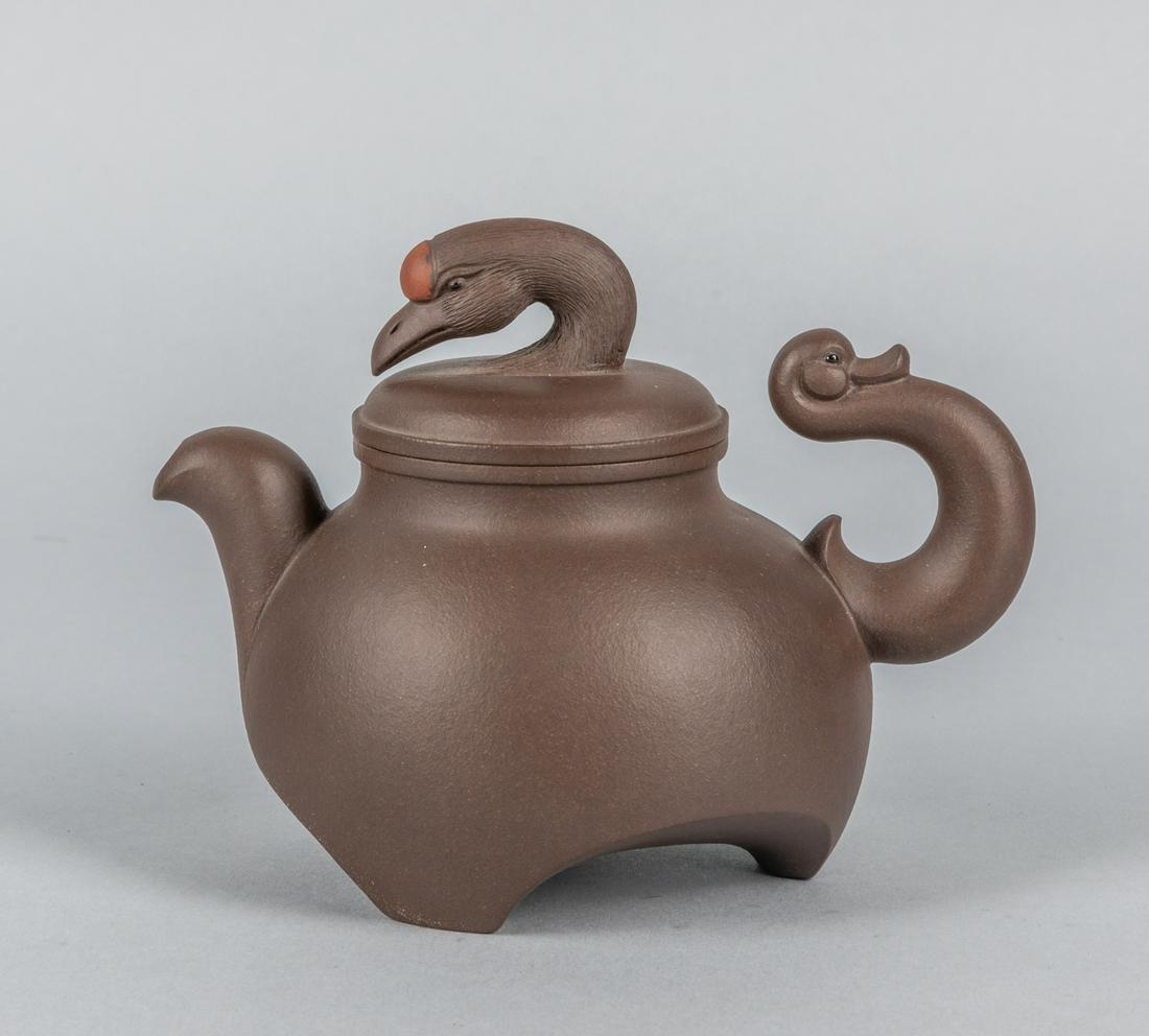 Chinese Yixing Zisha Teapot: Chinese carved art tea pot. Special type. 5.5 inch L; 4.25 inch H.