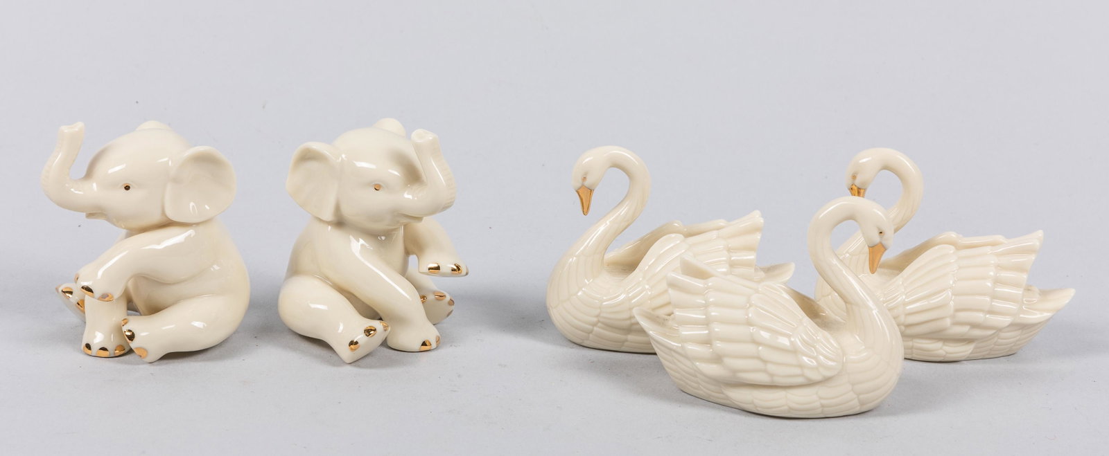 Set Of Lenox Porcelains: Set of 5 pieces including 2 elephants and 3 swans. 1.99*2.88 inch (elephant)