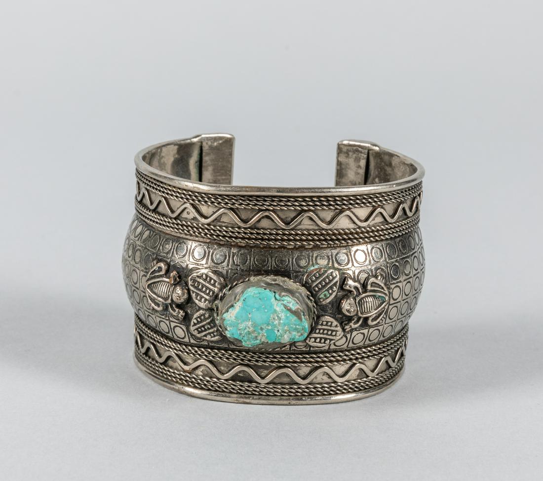 Native American Type Silver & Turquoise Cuff: Native American type cuff with turquoise stone in central. 2 inch H; 2.5 inch W open size.