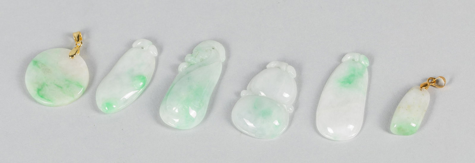 Group of Chinese Jadeite Carvings: Group of six Chinese jadeite carvings. 1.75 inch L. (largest).