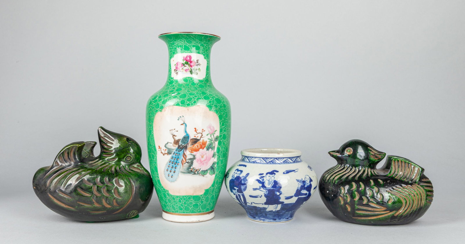 Set of Chinese Porcelain Wares: Set of four pieces Chinese porcelain wares, two green glazed mandarin ducks, one vase and one blue and white jar, minor chips on the mandarin ducks. 4.5x10.25 inch.