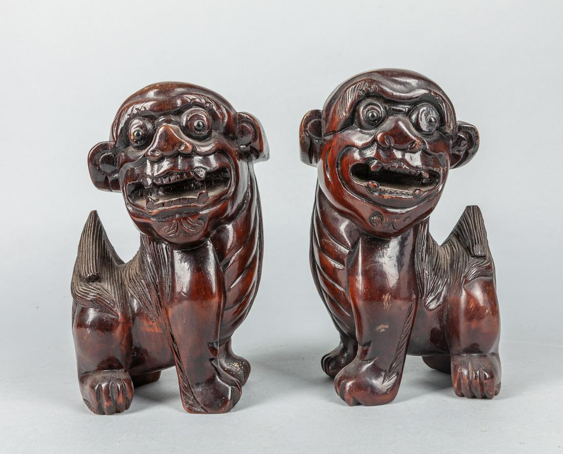 Pairs Chinese Wood Foo Dogs: Designed pairs Chinese wood foo dogs. 8 inch H; 5 inch W.