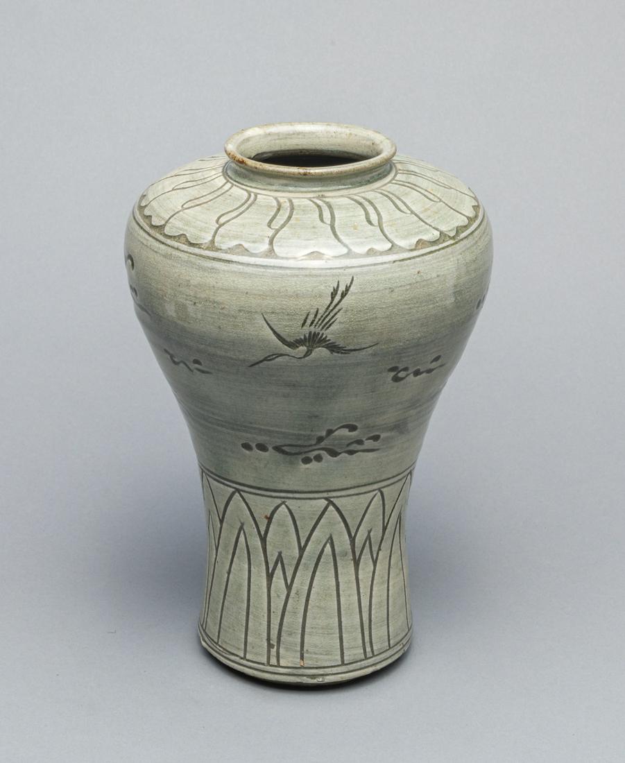 Korean Joseon Type Celadon Porcelain Vase: Of globular form tapering to a flat base and rising to rounded shoulders surmounted by a short neck and everted rim, decorated with crane and cloud, applied overall in pale celadon tone. 5.8 inch D; 7