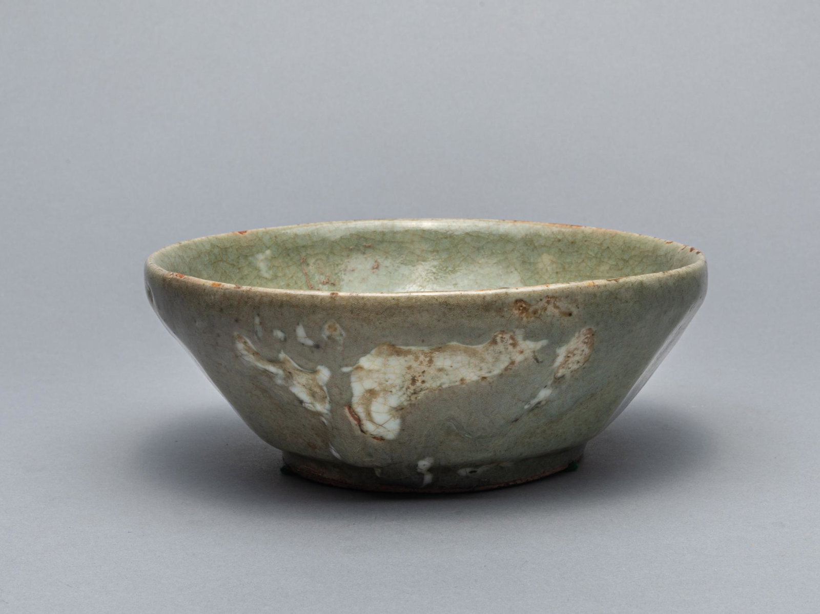 Korean Joseon Type Celadon Bowl: Fine joseon dynasty type Korean celadon glazed porcelain bowl with crack line under glazed. 7.5 inch D; 2.75 inch H.