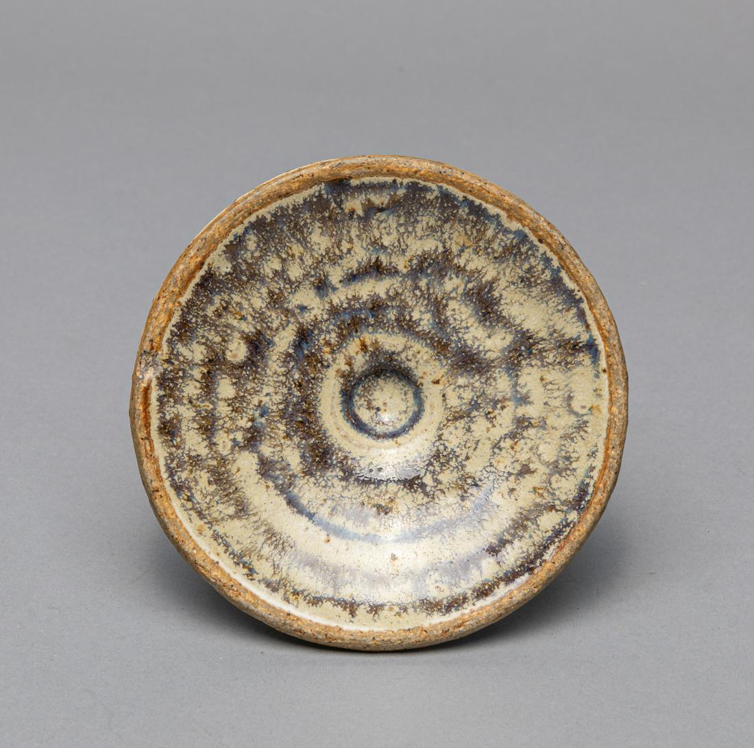Korean Flambe Glazed Porcelain Stand: Korean flambe glazed porcelain stand. 4.5 inch D, 2 inch H.