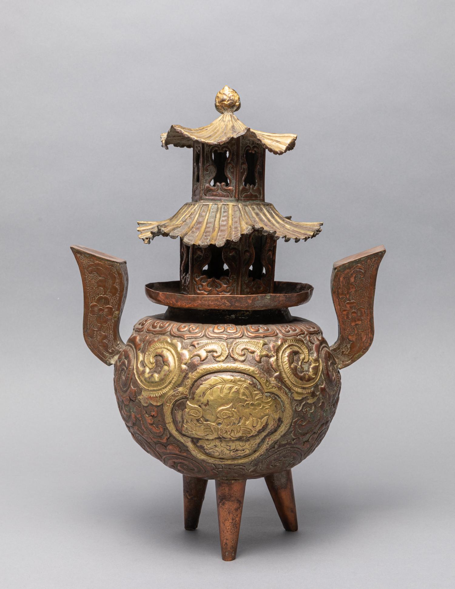 Chinese Gold on Brass Tower Type Censer: Chinese gold on brass tower type censer, with compressed globular body rising from three short tapering feet, exterior carved with archaistic patterns. 10*6*14 inch.
