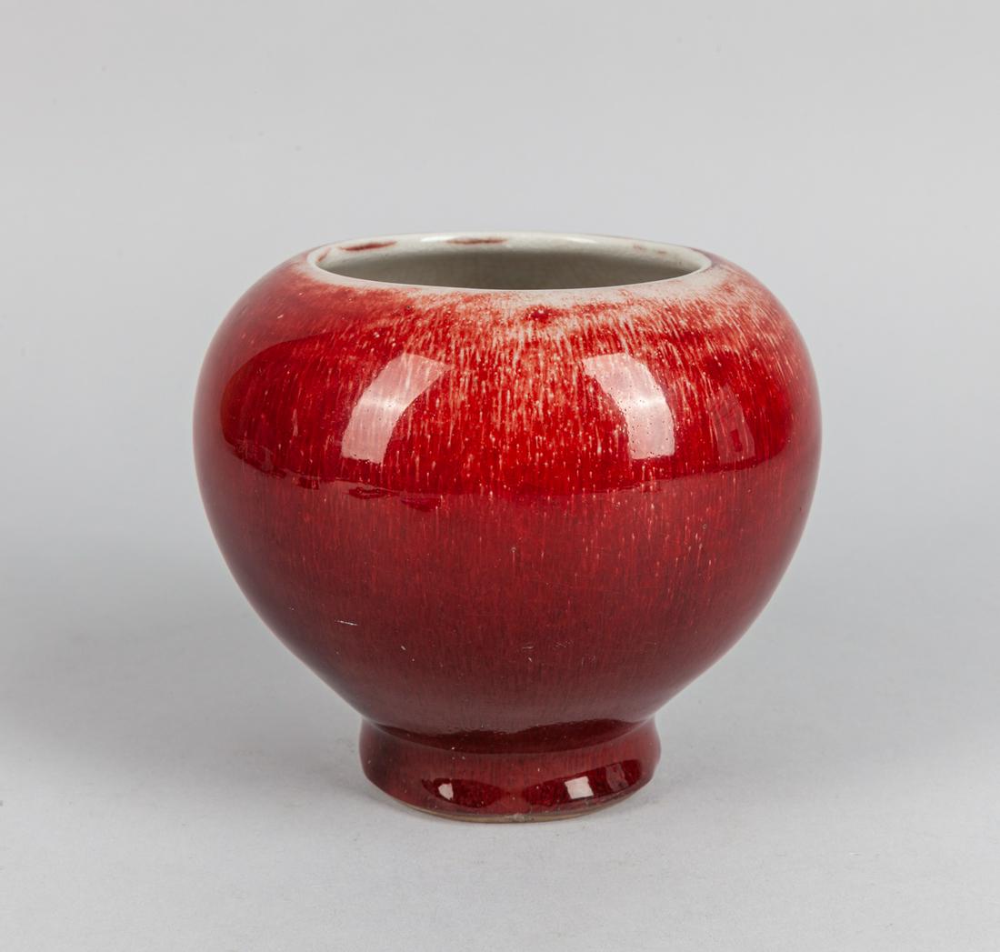 Chinese Flambe Glazed Tall Foot Brush Washer: Chinese flambe glazed tall foot brush washer, finely potted of compressed globular form, the exterior covered with a rich red glaze. 4.75*3.5 inch.